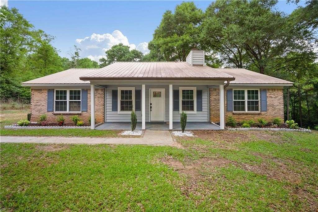 6.4 Acres of Land with Home for Sale in Wilmer, Alabama