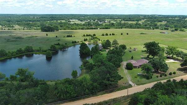 10 Acres of Land with Home for Sale in Okemah, Oklahoma