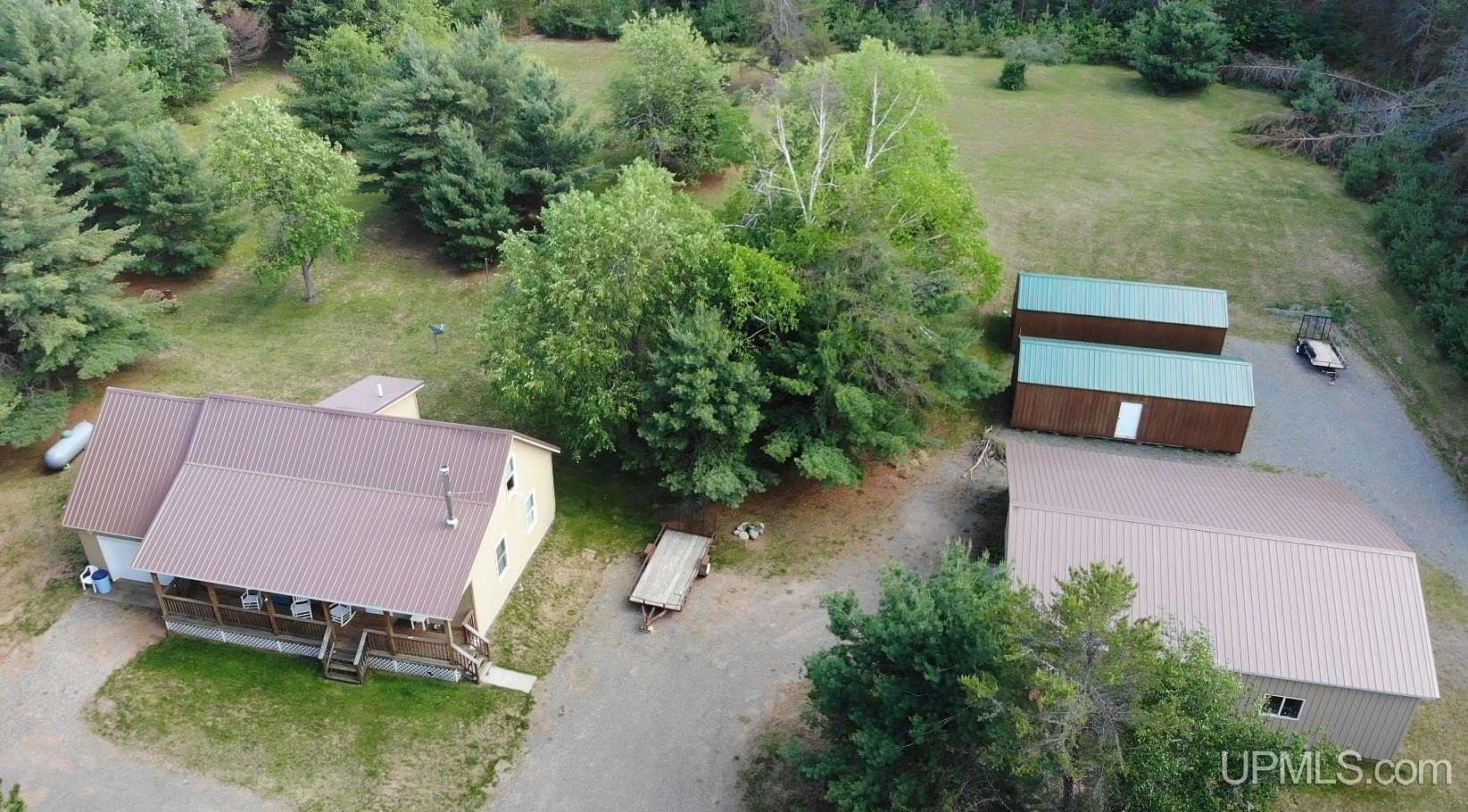 4 Acres of Land with Home for Sale in Kenton, Michigan