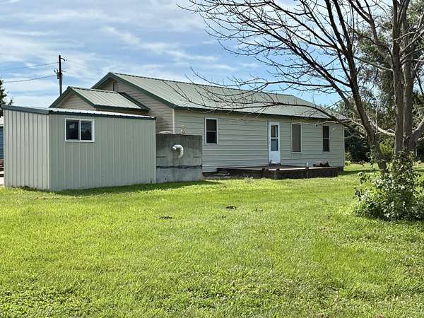 80 Acres of Land with Home for Sale in Weaubleau, Missouri
