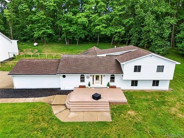 5 Acres of Land with Home for Sale in Putnam Township, Michigan
