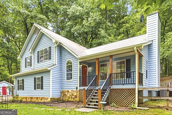 6.14 Acres of Land with Home for Sale in Fairburn, Georgia