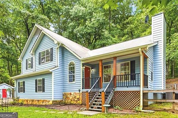 6.14 Acres of Land with Home for Sale in Fairburn, Georgia