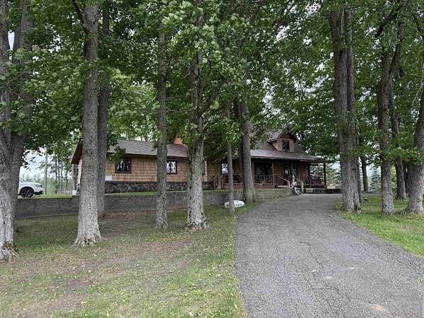 11 Acres of Recreational Land with Home for Sale in Rose City, Michigan