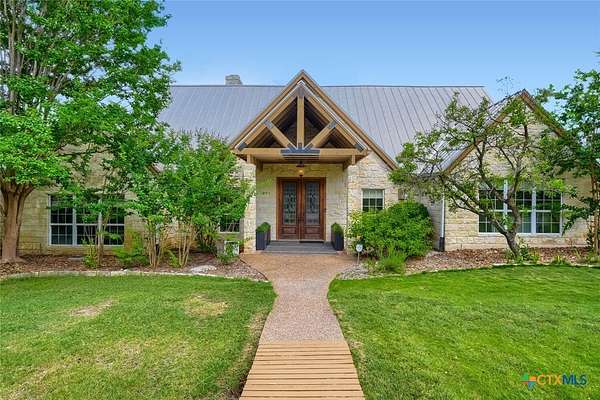 18.1 Acres of Land with Home for Auction in Wimberley, Texas
