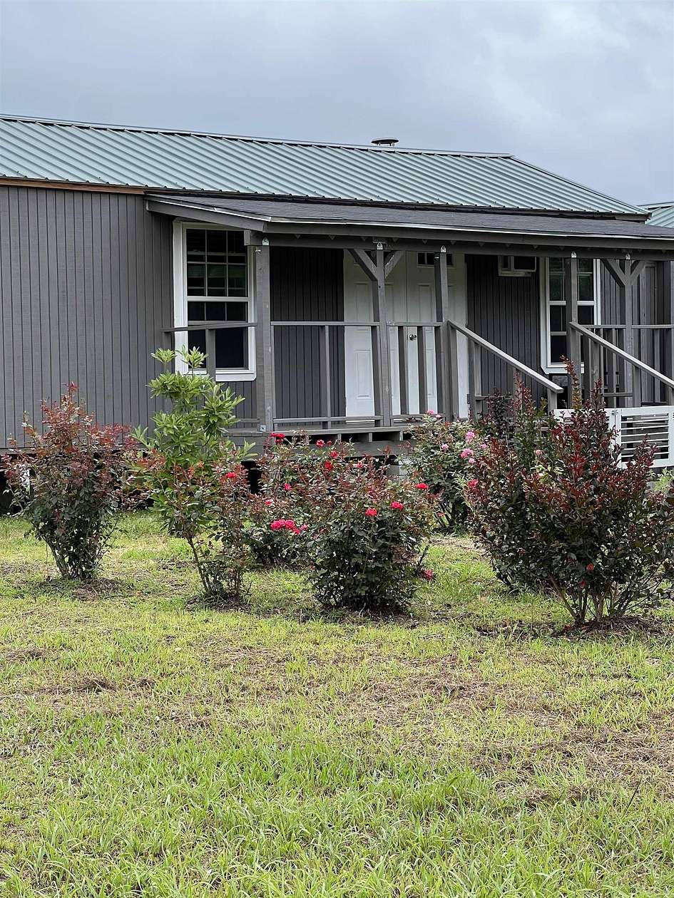 12.6 Acres of Land with Home for Sale in Bonnerdale, Arkansas
