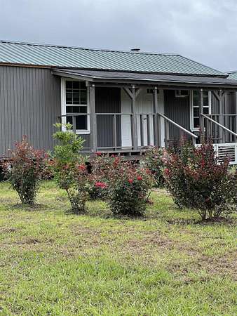 12.6 Acres of Land with Home for Sale in Bonnerdale, Arkansas