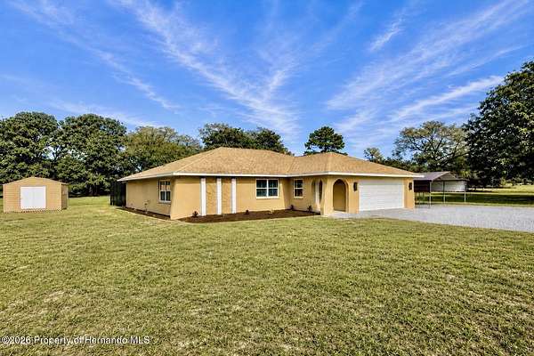 2.5 Acres of Land with Home for Sale in Spring Hill, Florida