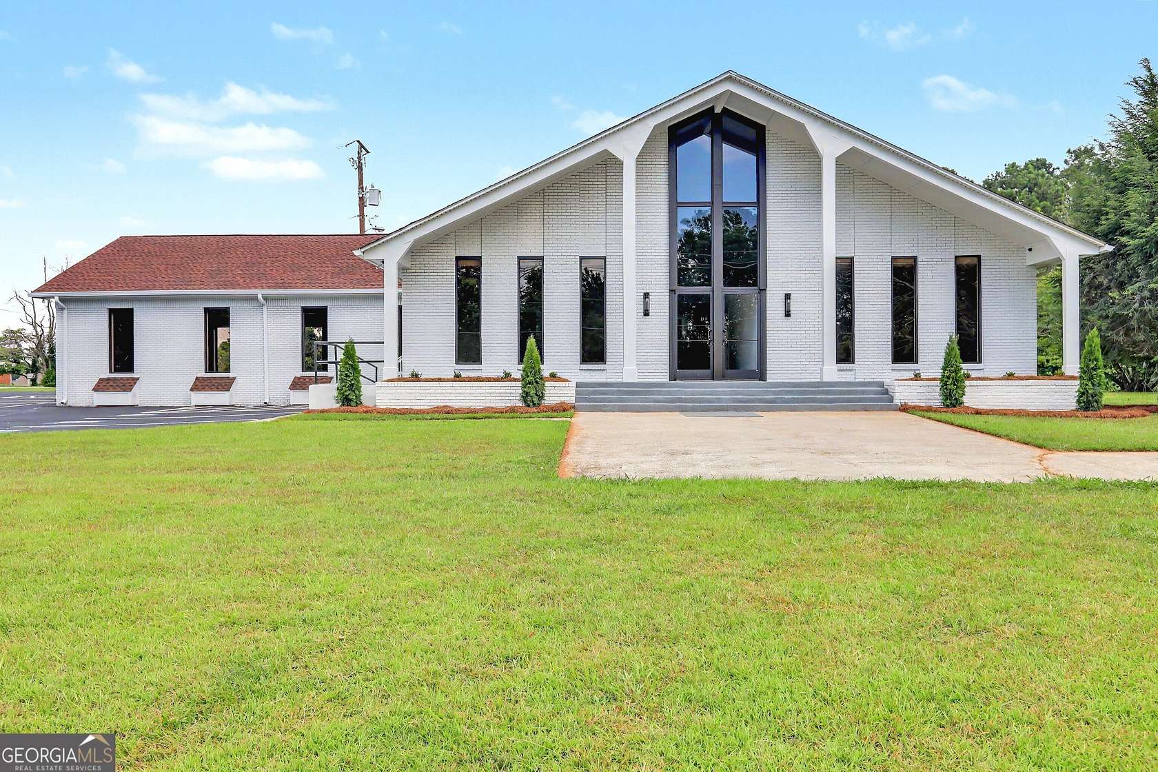 2.62 Acres of Improved Commercial Land for Sale in Rex, Georgia