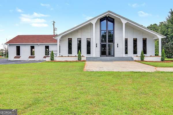 2.62 Acres of Improved Commercial Land for Sale in Rex, Georgia