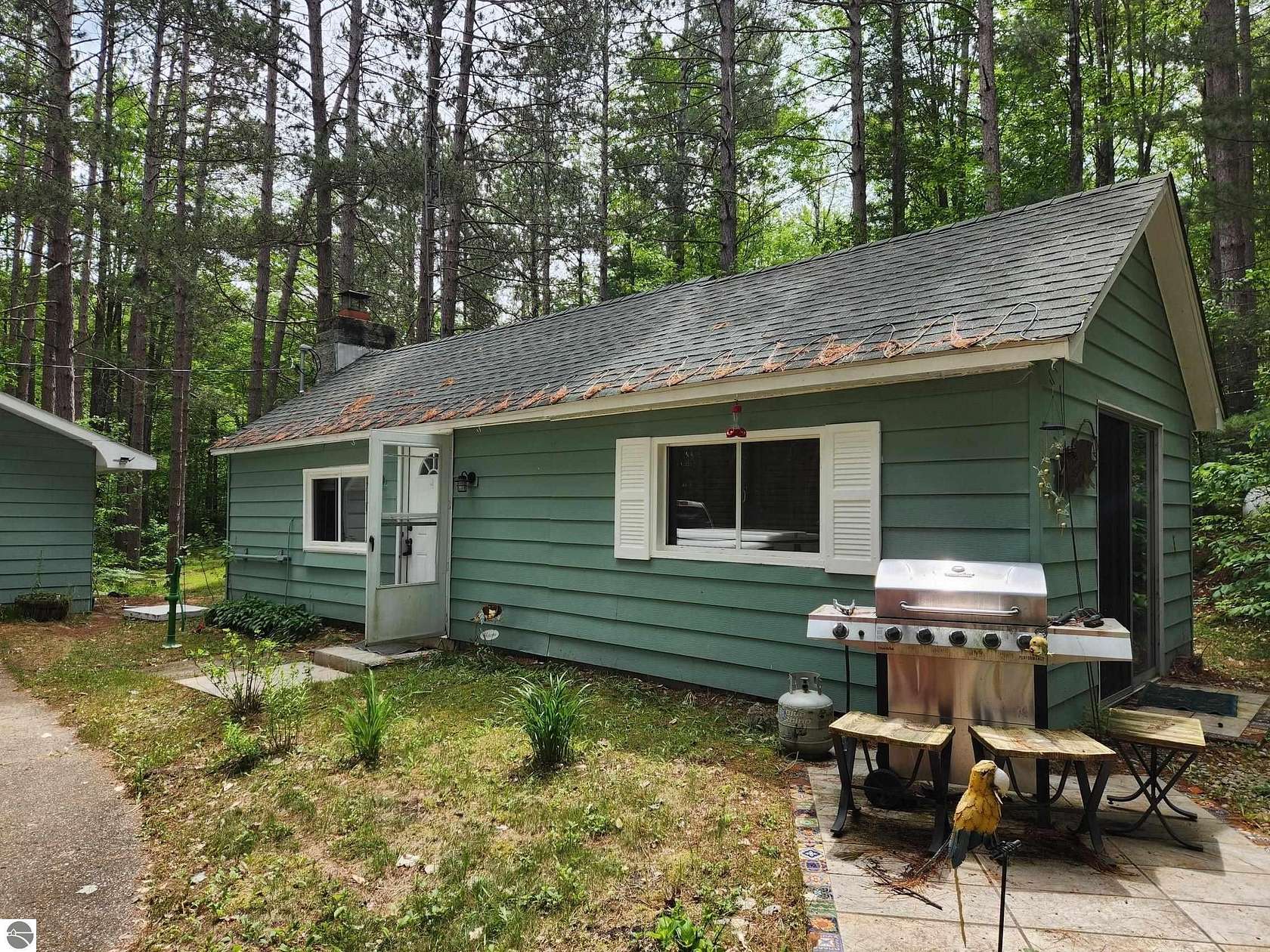 5 Acres of Land with Home for Sale in Kalkaska, Michigan