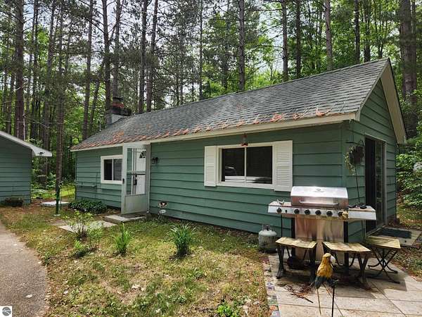 5 Acres of Land with Home for Sale in Kalkaska, Michigan