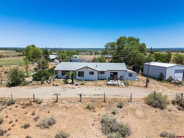 5 Acres of Land with Home for Sale in Cortez, Colorado