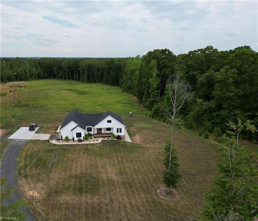 13.3 Acres of Land with Home for Sale in Stoneville, North Carolina