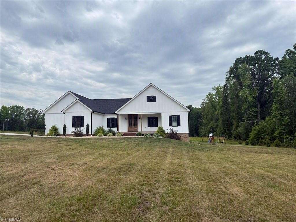 13.3 Acres of Land with Home for Sale in Stoneville, North Carolina
