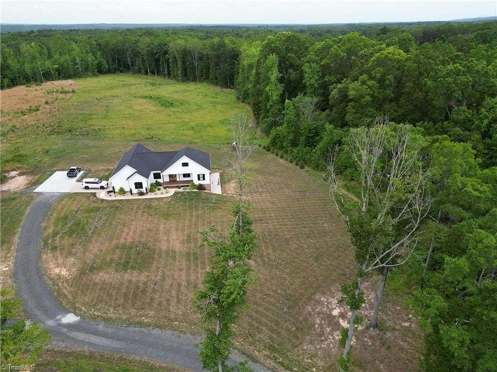 13.3 Acres of Land with Home for Sale in Stoneville, North Carolina