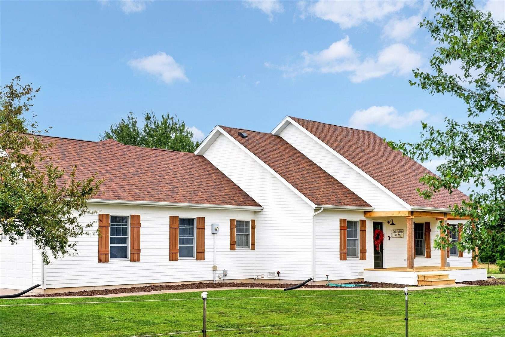 10 Acres of Land with Home for Sale in Fair Grove, Missouri