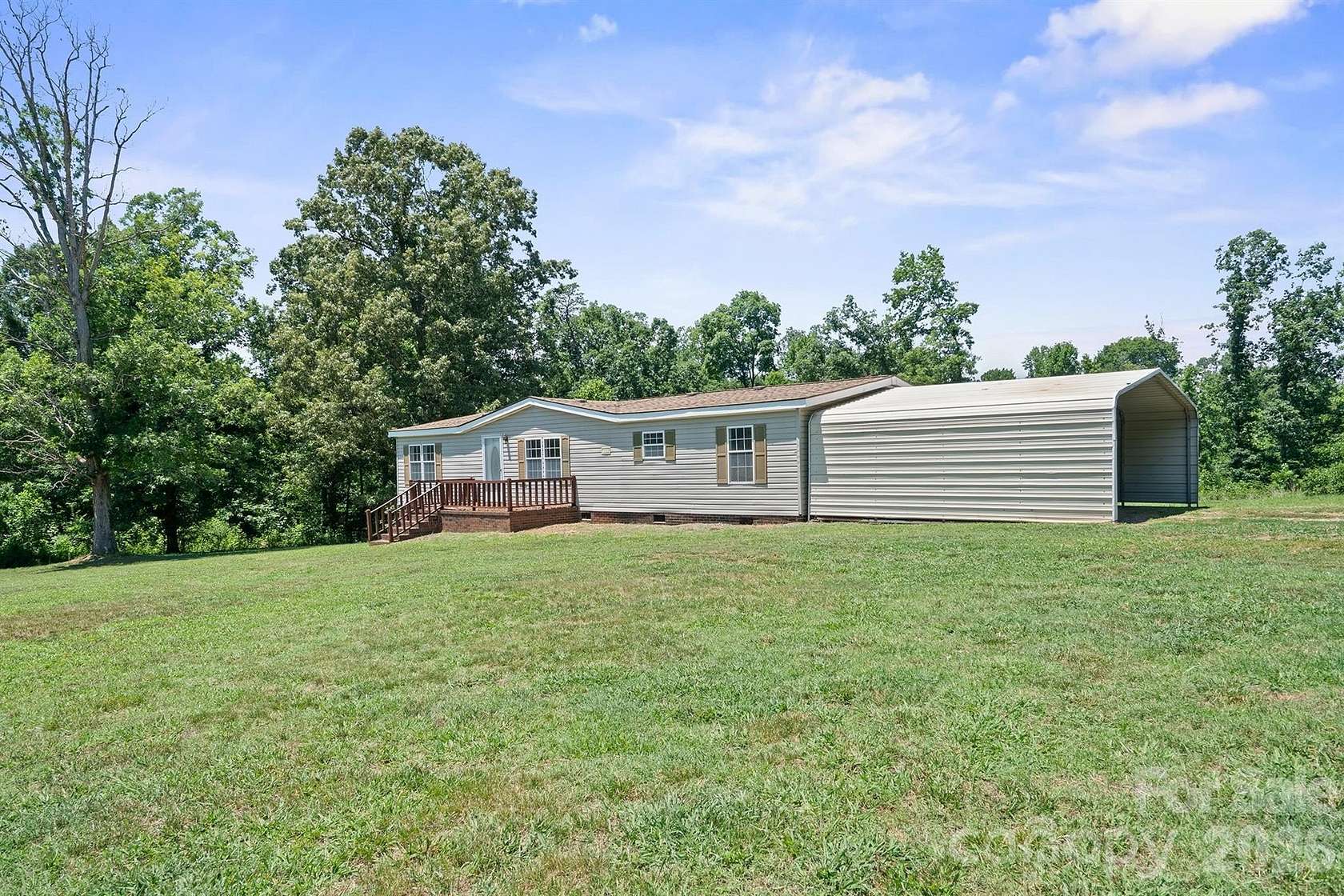 10.5 Acres of Land with Home for Sale in Statesville, North Carolina