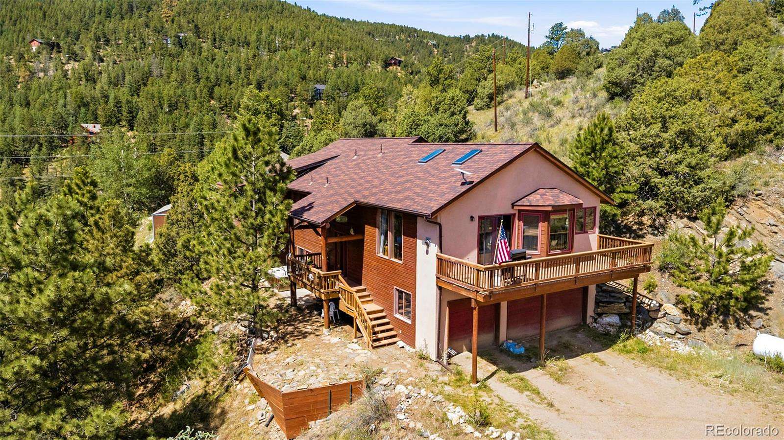 2.55 Acres of Land with Home for Sale in Evergreen, Colorado