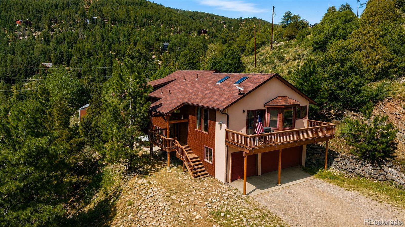 2.55 Acres of Land with Home for Sale in Evergreen, Colorado