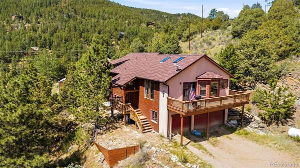 2.55 Acres of Land with Home for Sale in Evergreen, Colorado