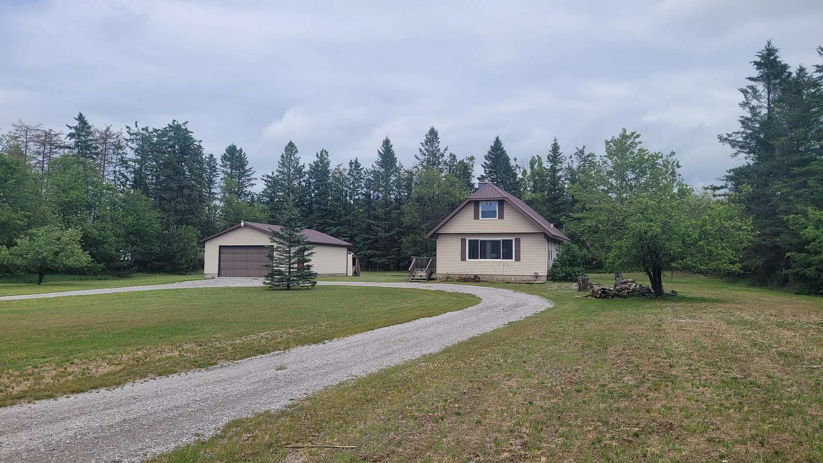 2 Acres of Land with Home for Sale in Atlanta, Michigan