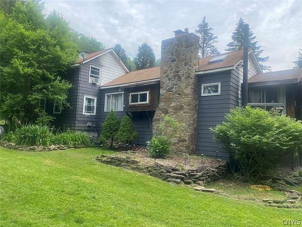 21.3 Acres of Land with Home for Sale in Scio, New York