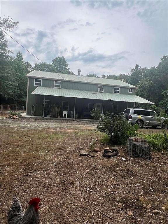 5.3 Acres of Land with Home for Sale in Bowdon, Georgia