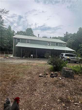 5.3 Acres of Land with Home for Sale in Bowdon, Georgia