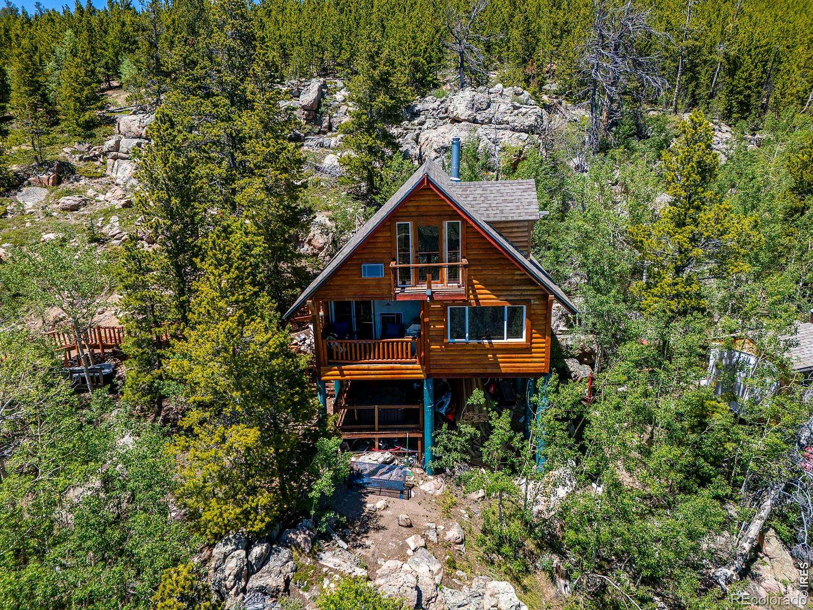 3 Acres of Land with Home for Sale in Red Feather Lakes, Colorado