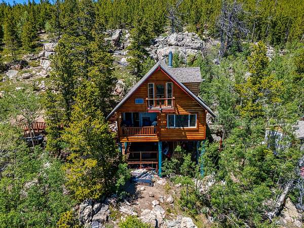 3 Acres of Land with Home for Sale in Red Feather Lakes, Colorado