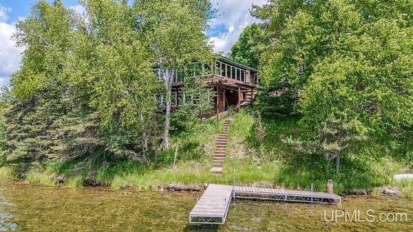 8.6 Acres of Land with Home for Sale in Crystal Falls, Michigan