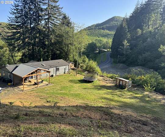1.58 Acres of Land with Home for Sale in Westlake, Oregon