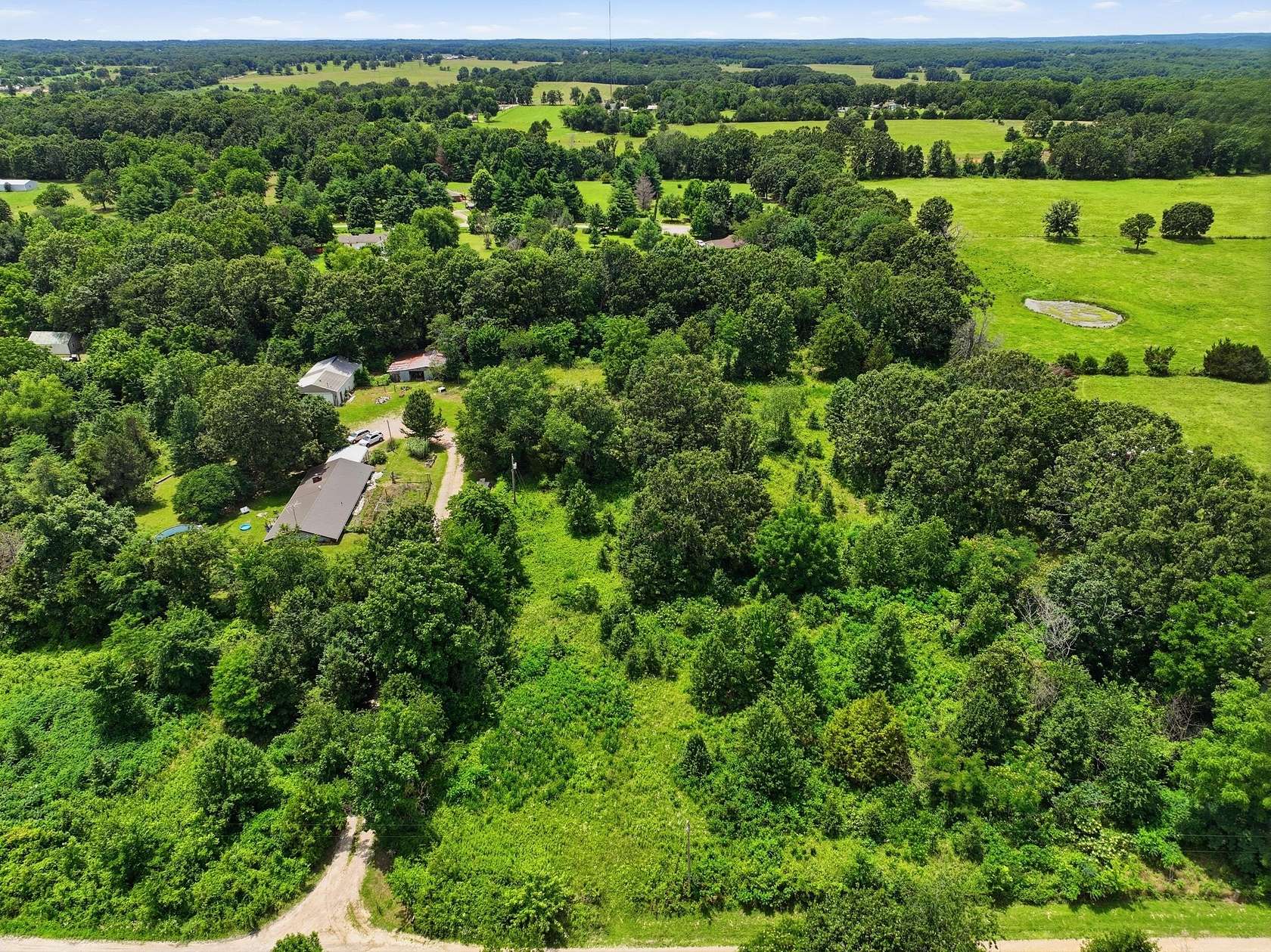 6.6 Acres of Land with Home for Sale in West Plains, Missouri