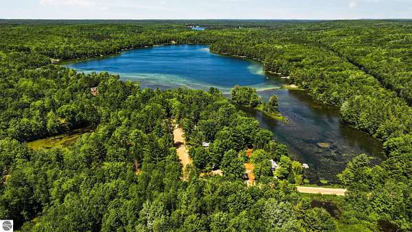 2.12 Acres of Land with Home for Sale in Kalkaska, Michigan
