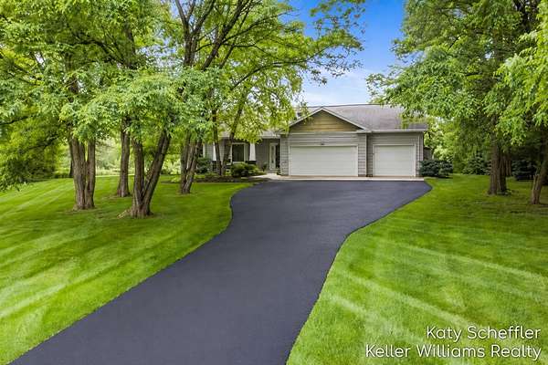 2.3 Acres of Land with Home for Sale in Rockford, Michigan