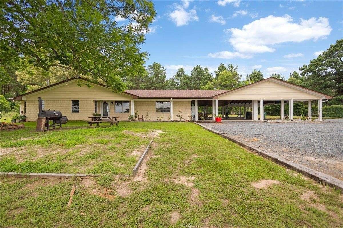 3.64 Acres of Land with Home for Sale in Naples, Texas