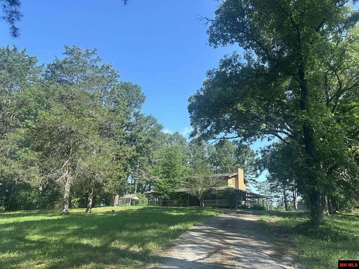 7.5 Acres of Land with Home for Sale in Calico Rock, Arkansas