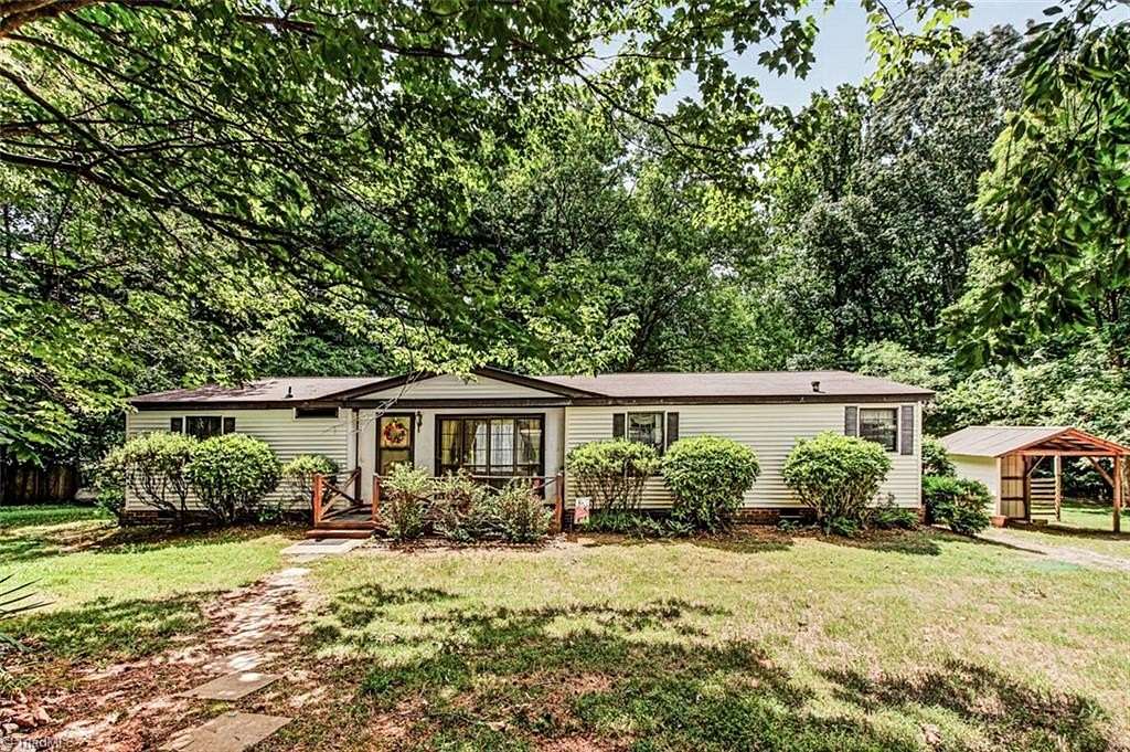 3.8 Acres of Land with Home for Sale in Staley, North Carolina