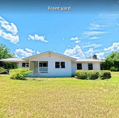 3.87 Acres of Land with Home for Sale in McAlpin, Florida