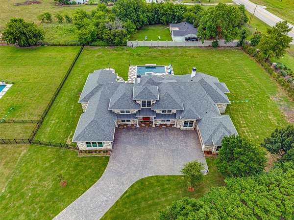 1.59 Acres of Land with Home for Sale in McLendon-Chisholm, Texas
