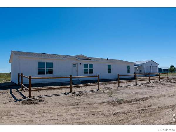 6.26 Acres of Land with Home for Sale in Wiggins, Colorado