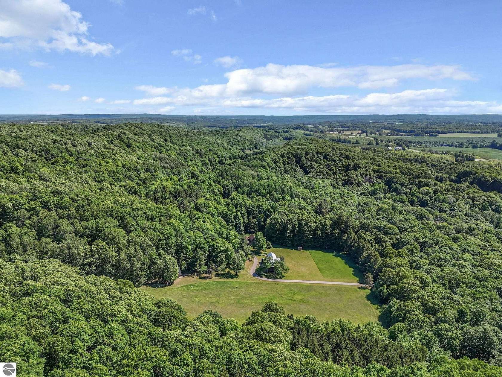 215 Acres of Recreational Land with Home for Sale in Cedar, Michigan