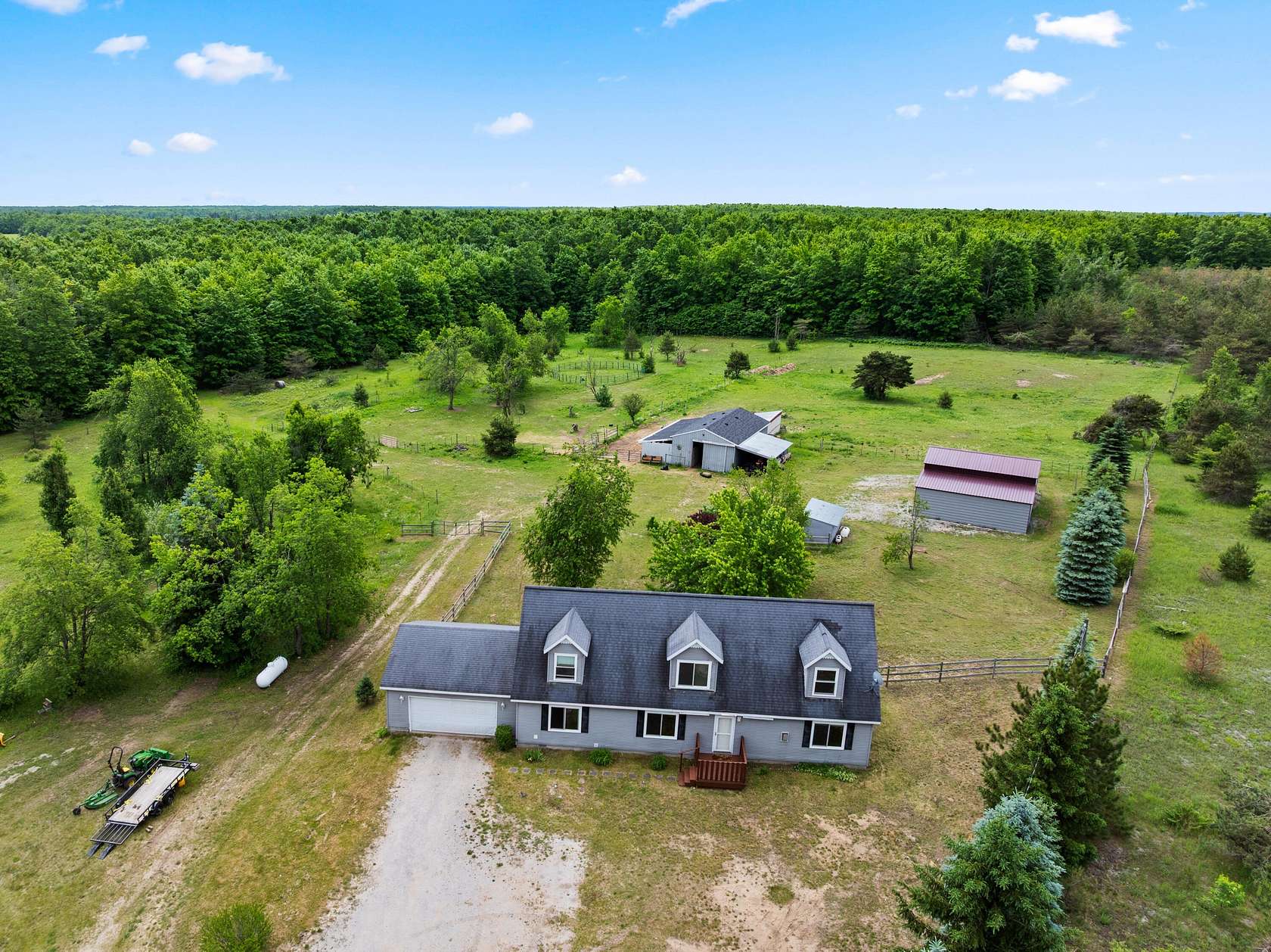 20 Acres of Land with Home for Sale in Frederic, Michigan