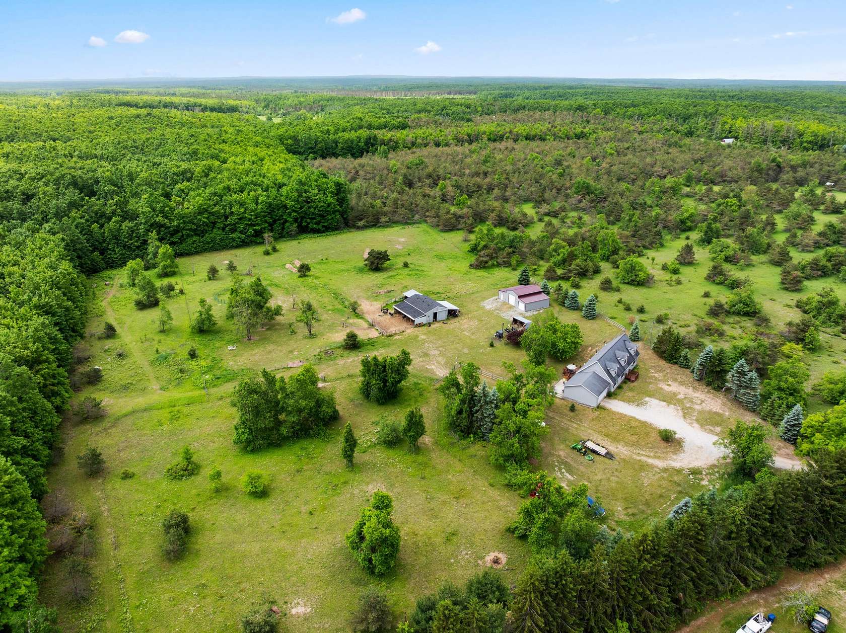 20 Acres of Land with Home for Sale in Frederic, Michigan