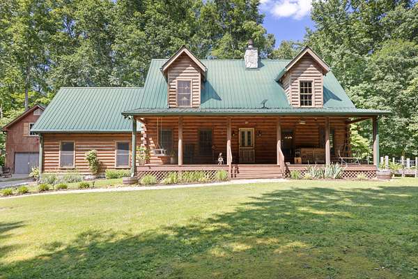 8.1 Acres of Land with Home for Sale in Ashland City, Tennessee