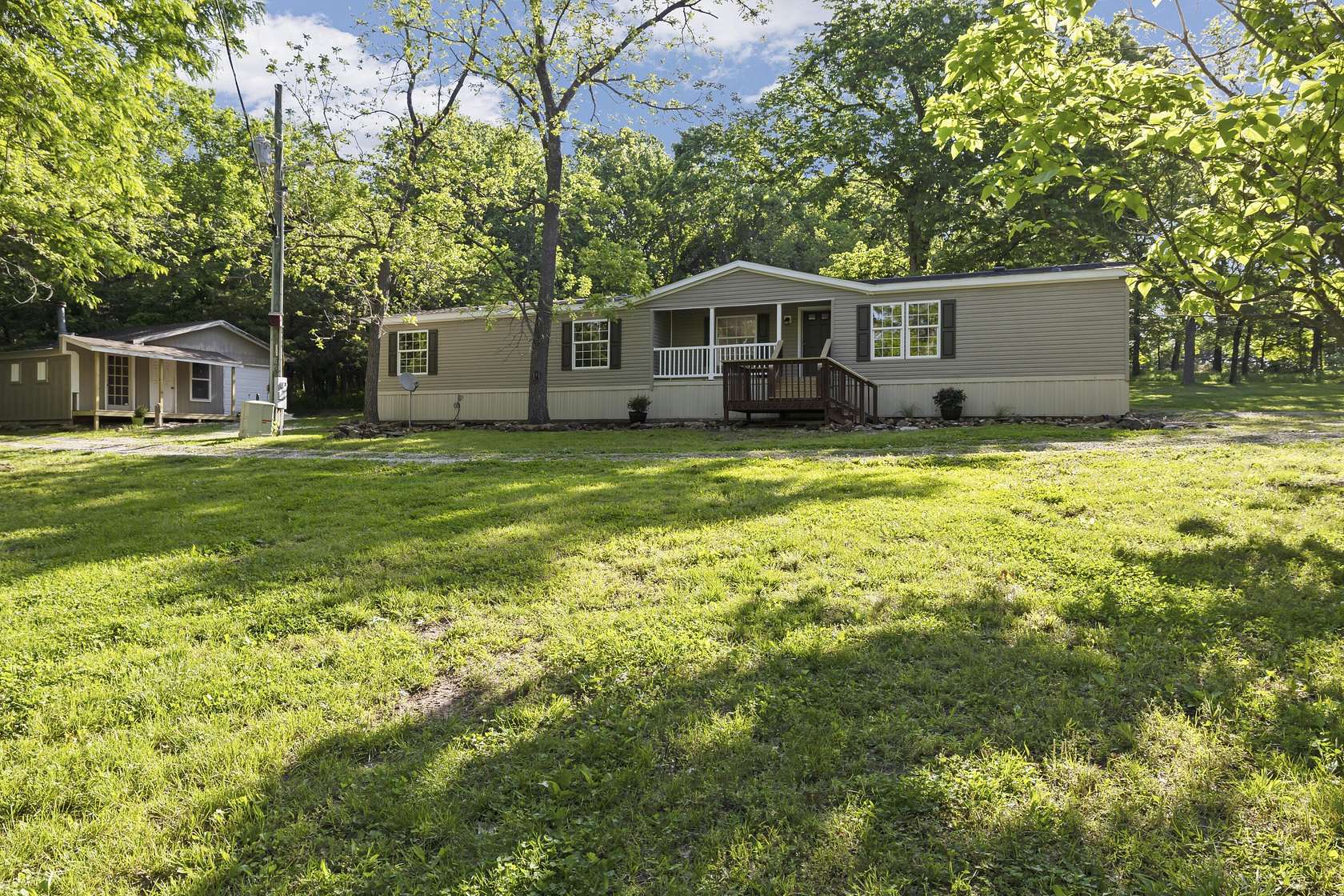 12.8 Acres of Land with Home for Sale in Weaubleau, Missouri