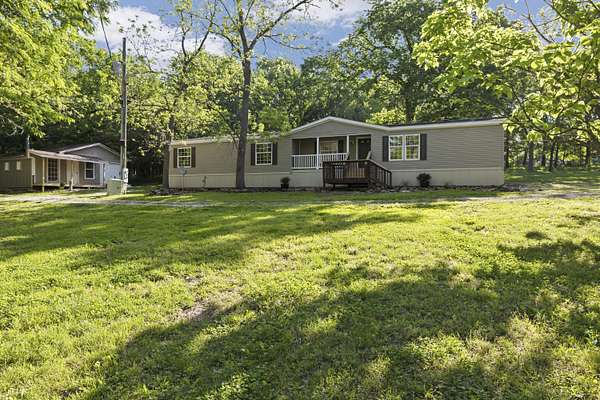 12.8 Acres of Land with Home for Sale in Weaubleau, Missouri