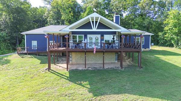 17.2 Acres of Recreational Land with Home for Sale in Etowah, Tennessee