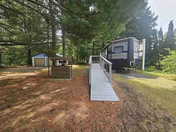 0.68 Acres of Land with Home for Sale in Harrison, Michigan